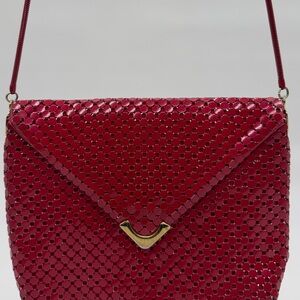 Chic Red Crossbody Bag with Gold Accents